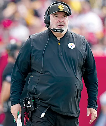 Mike McCarthy shrugs off foot injury
